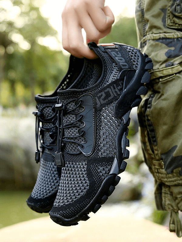 Breathable Elastic Camping Shoes, Men's Sports Sneakers with mesh upper, rubber outsole, EVA insole, held outdoors.
